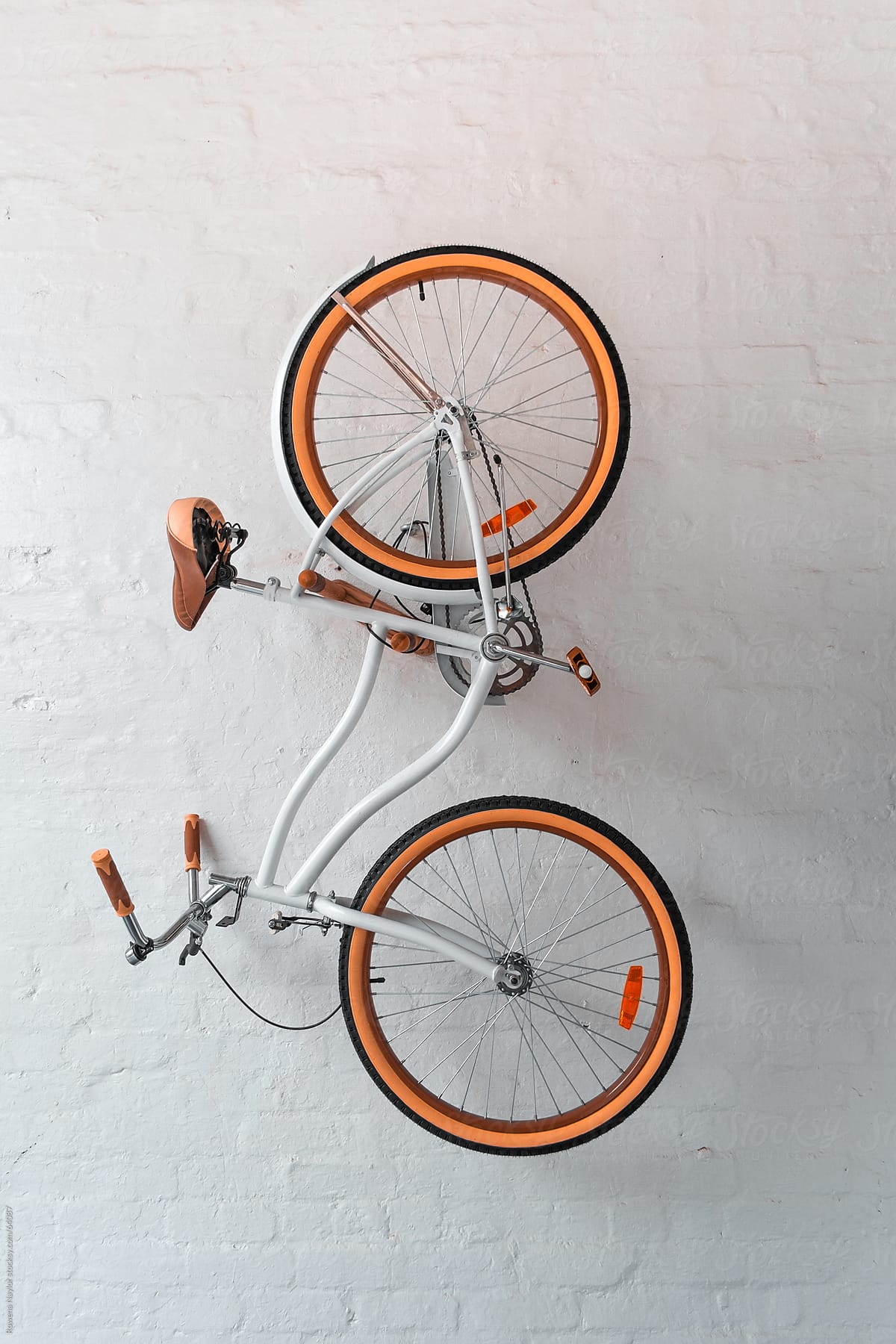 Retro Style Bike hanging on a White Wall