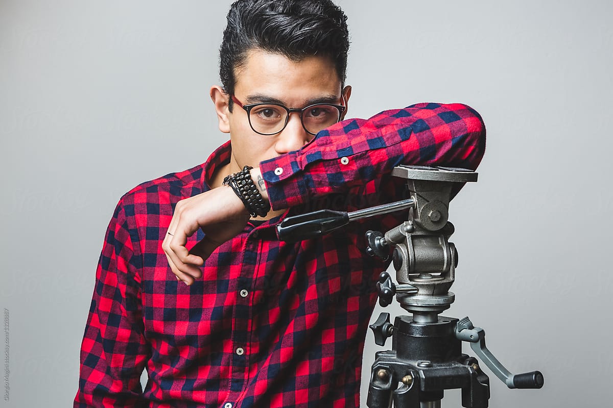 Young Photographer Portrait with a Tripod