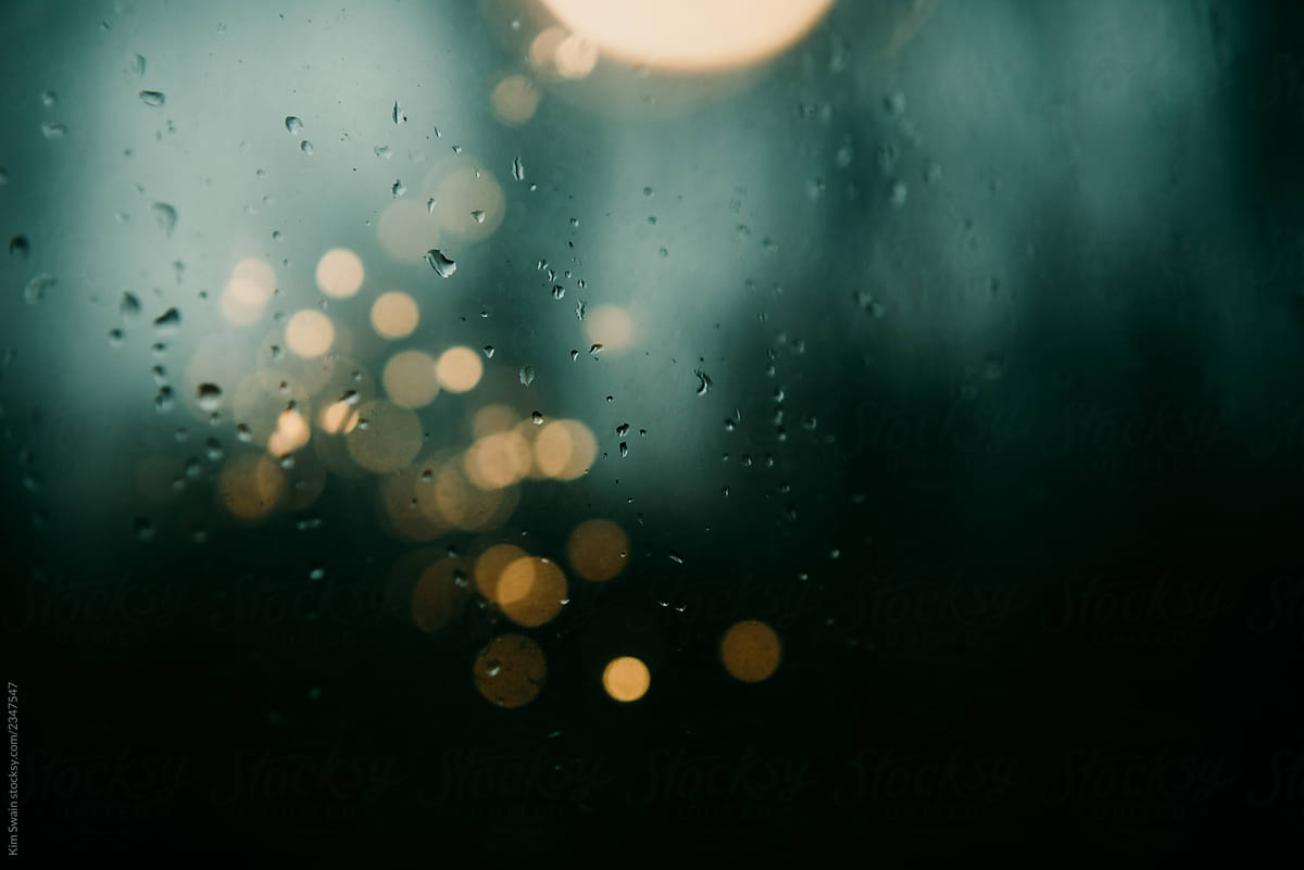 rain on window with bokeh