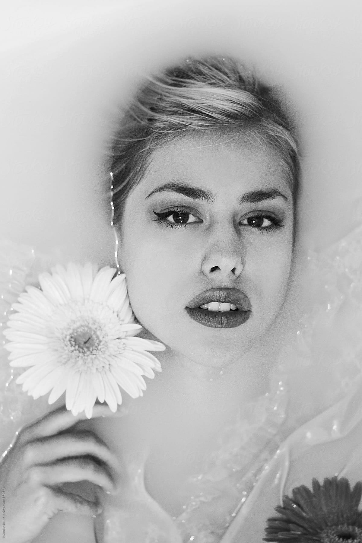 An Attractive Young Woman Lies In Milk Bath By Stocksy Contributor Jovana Rikalo Stocksy