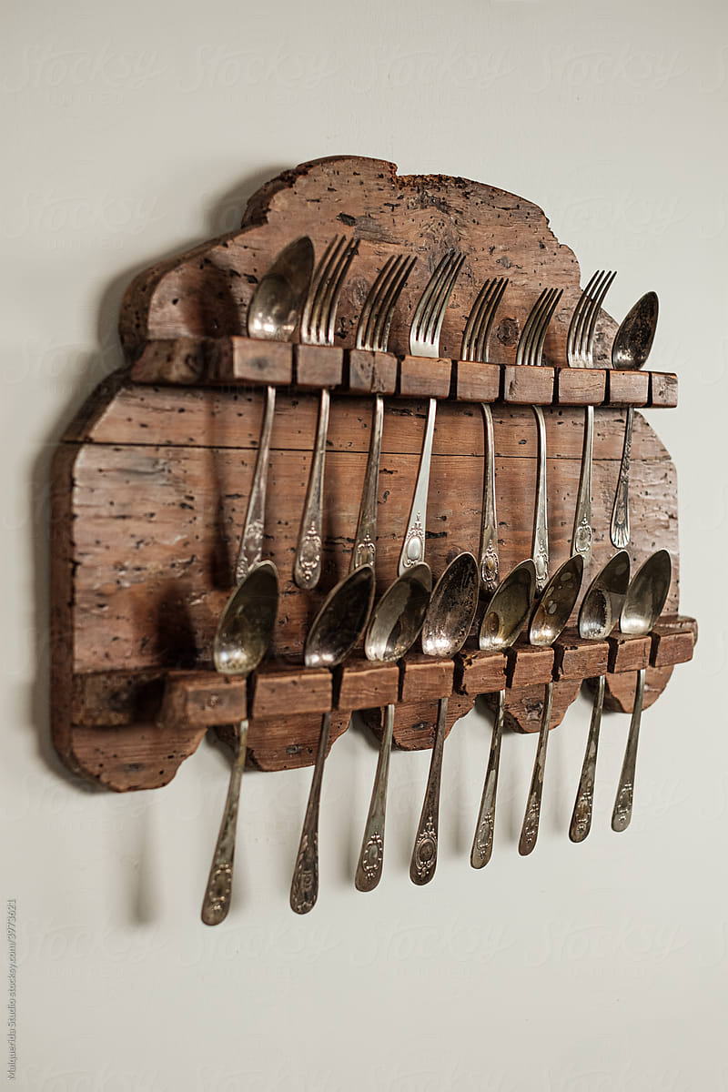 Antique cutlery display on the wall