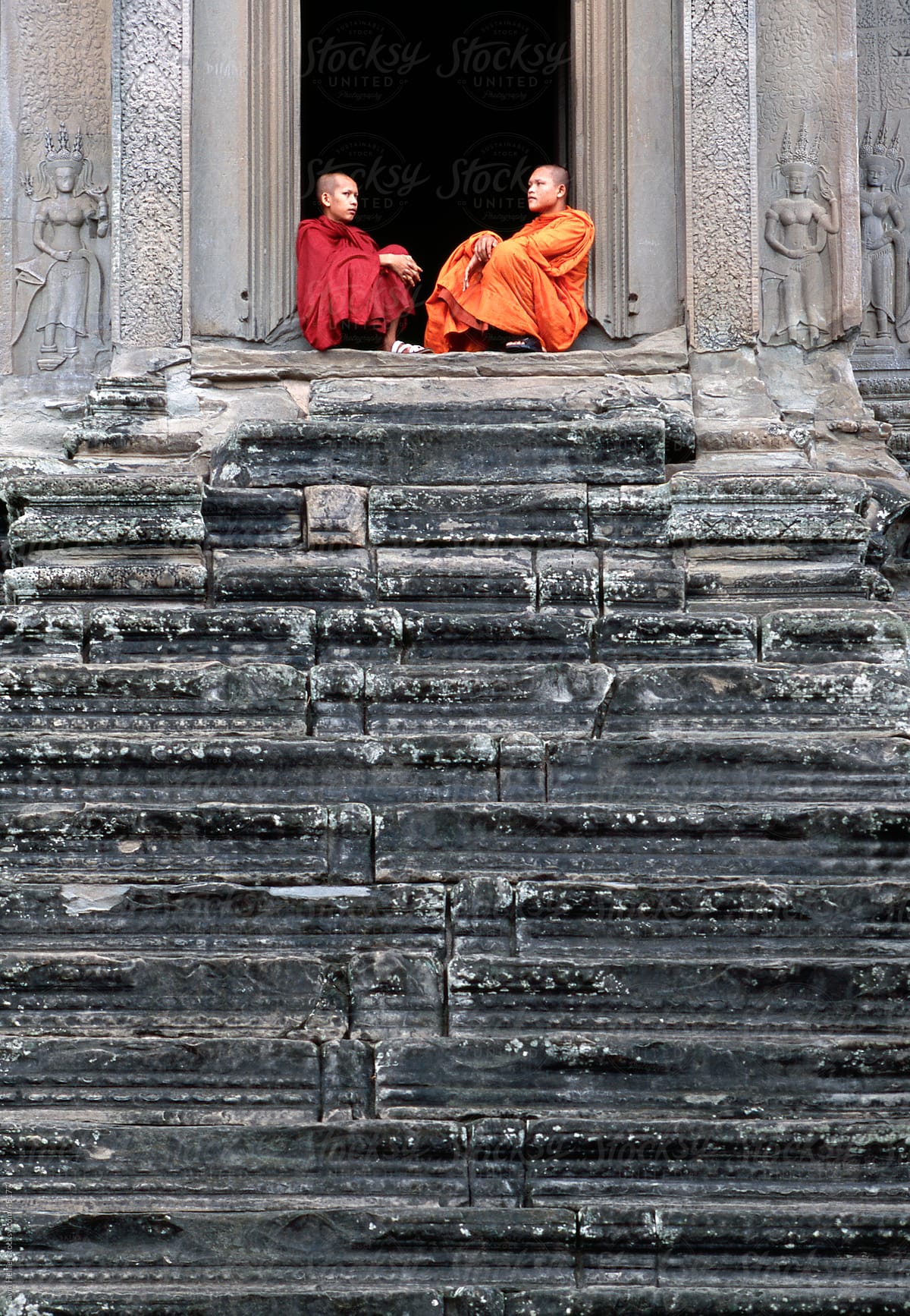 Monks on steps, Angkor Wat, Siem Reap, Cambodia, Indochina, Asia