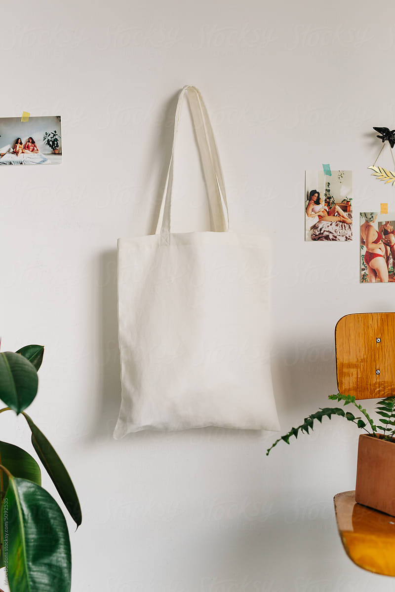a cloth bag hanging from the wall.