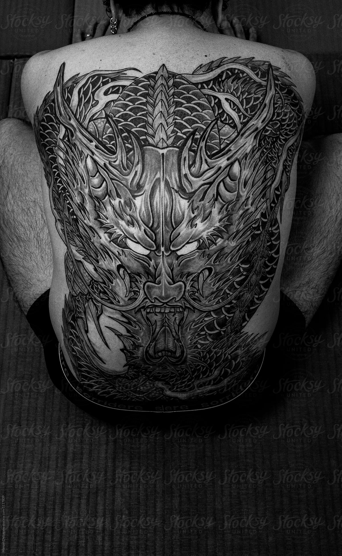 Japanese man with a Dragon tattooed on his back