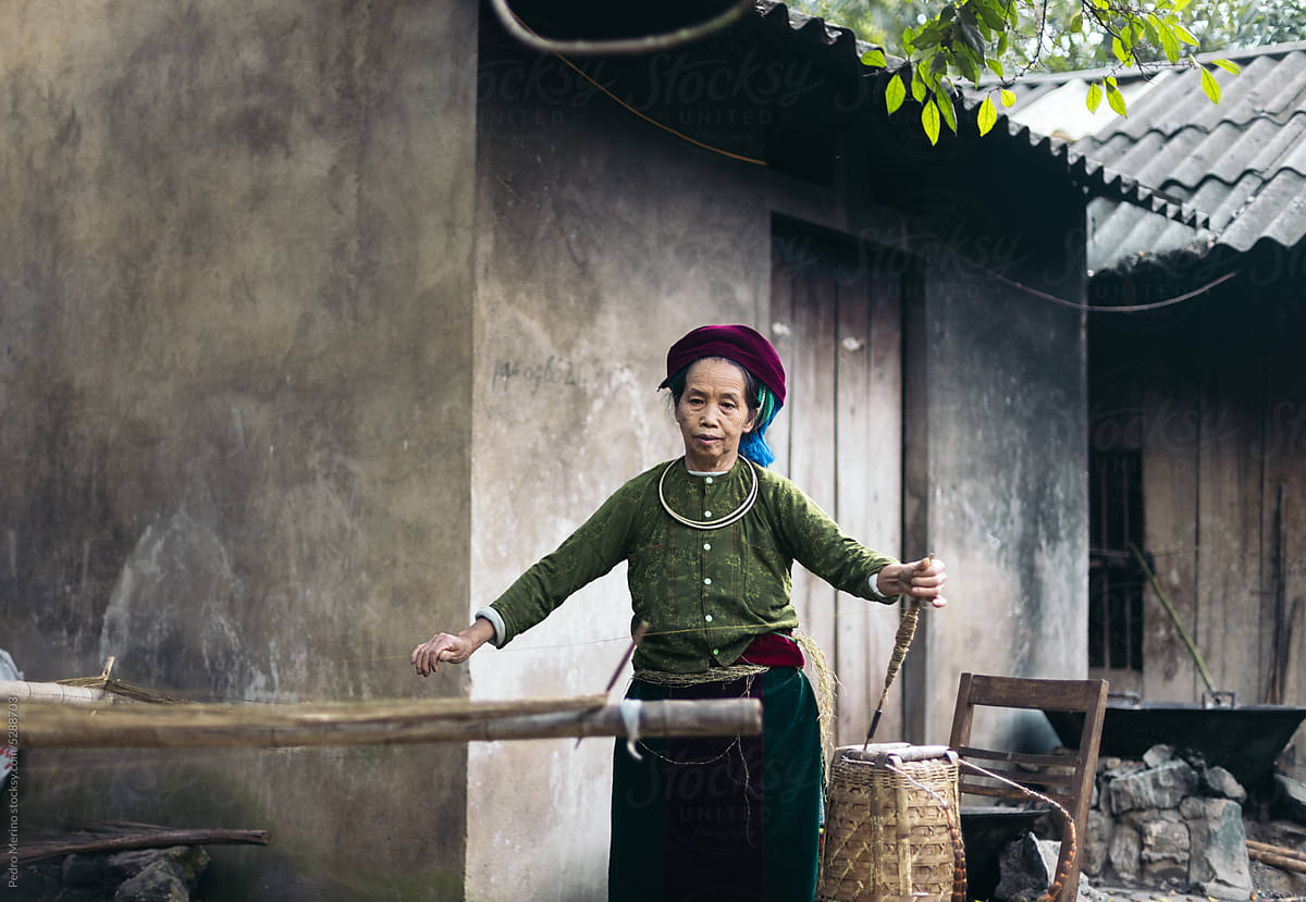 Hmong woman weaving in a workshop in the countryside in Vietnam