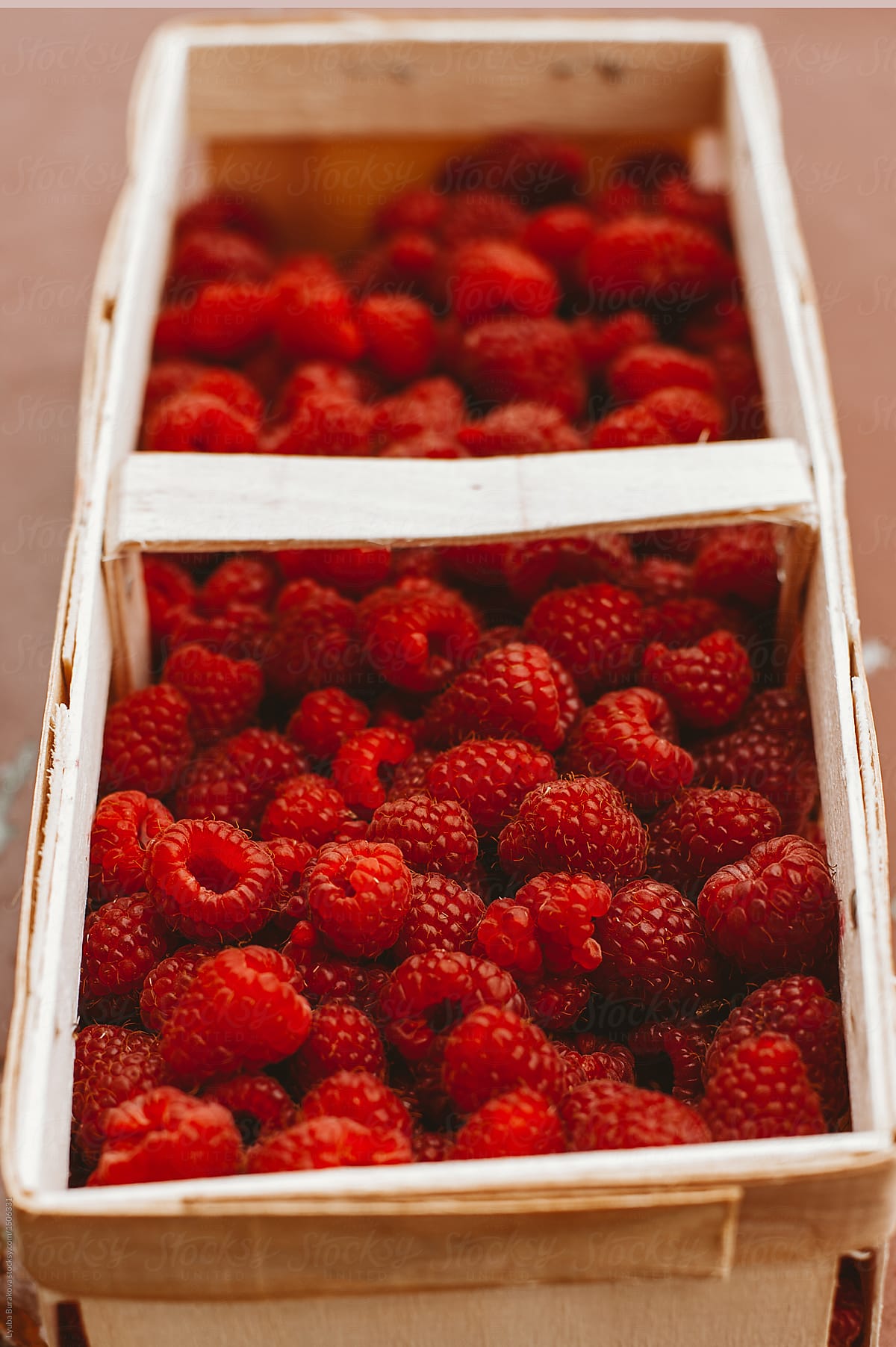 Container with fresh rasberries