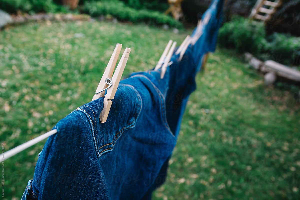 Blue jeans hung out to dry