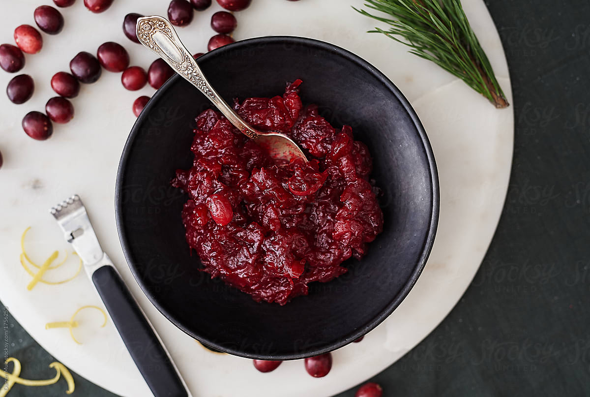 Homemade Cranberry sauce in a bowl on a table.