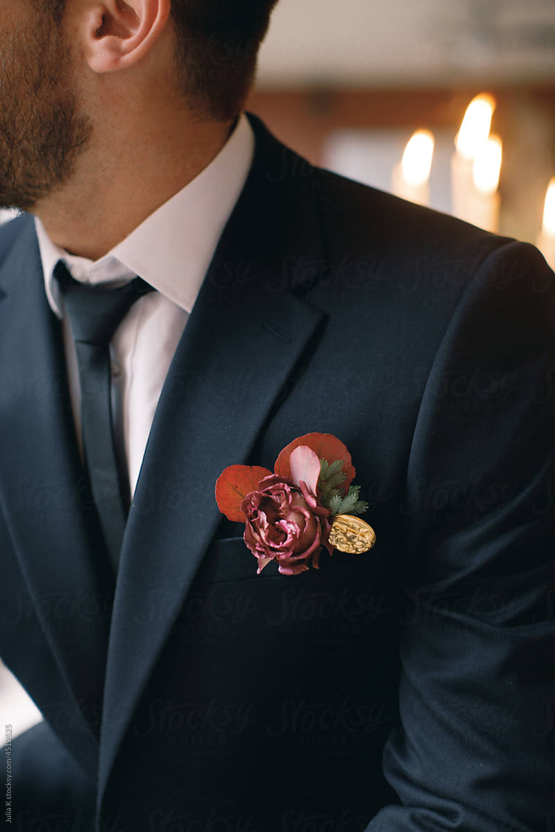 Groom With Pinned Flower To His Suit
