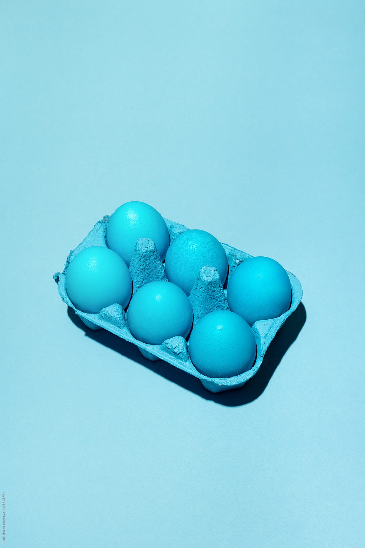 Blue Easter eggs with bold colors and shadows