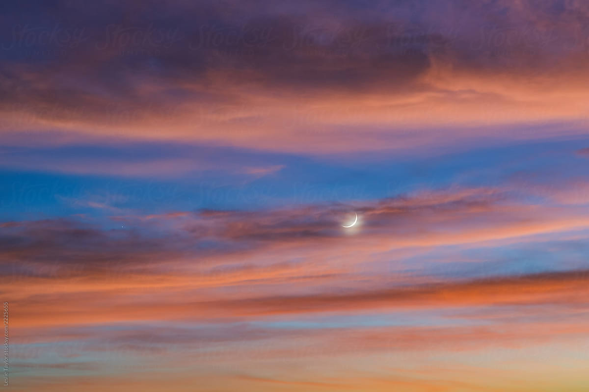 October Moon Through Sunset Clouds