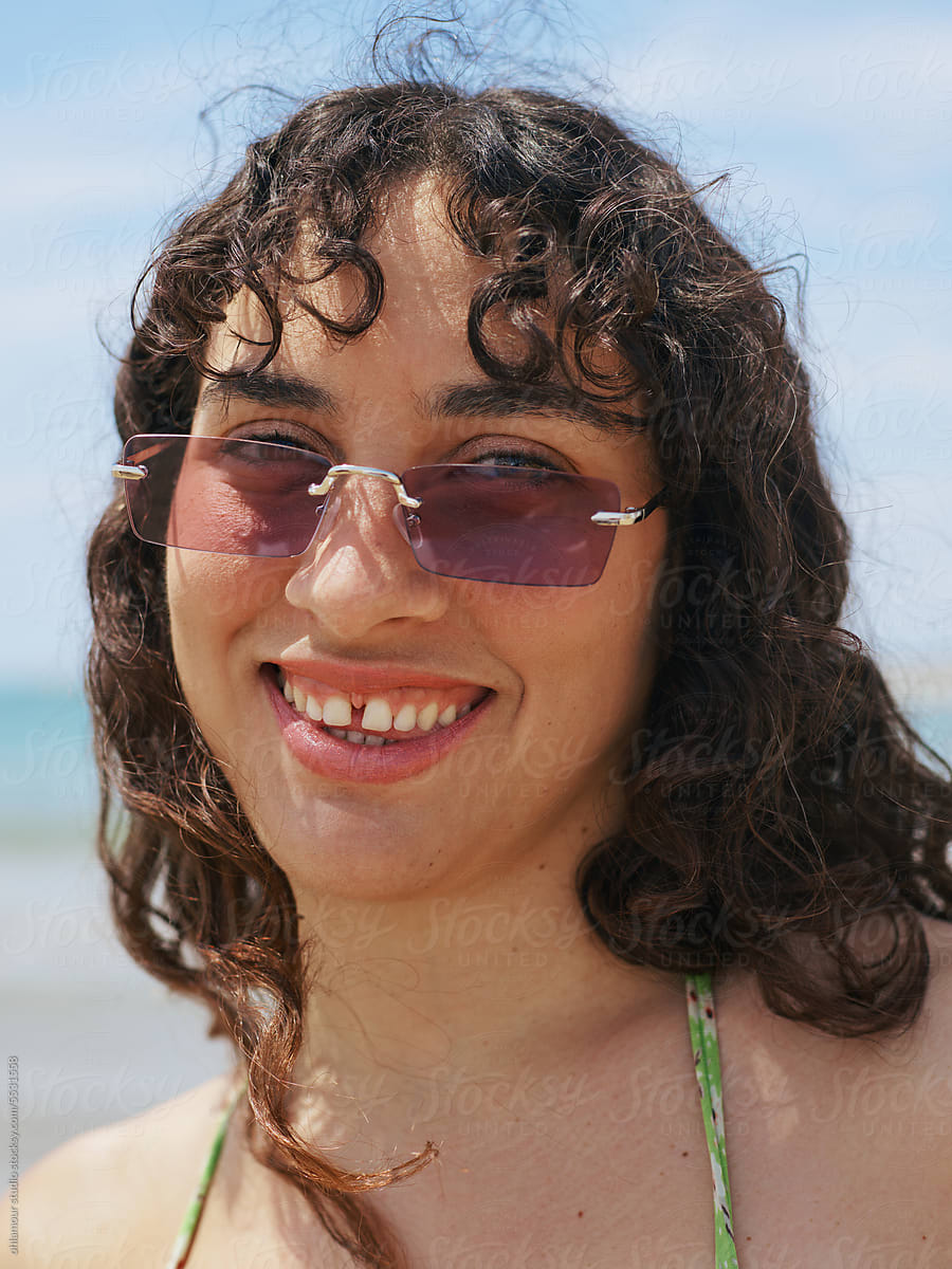 Salty Air & Curls: Beachside Portrait with Retro Shades