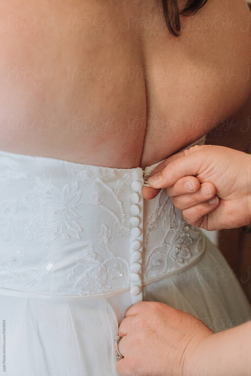 Zipping up Wedding Dress