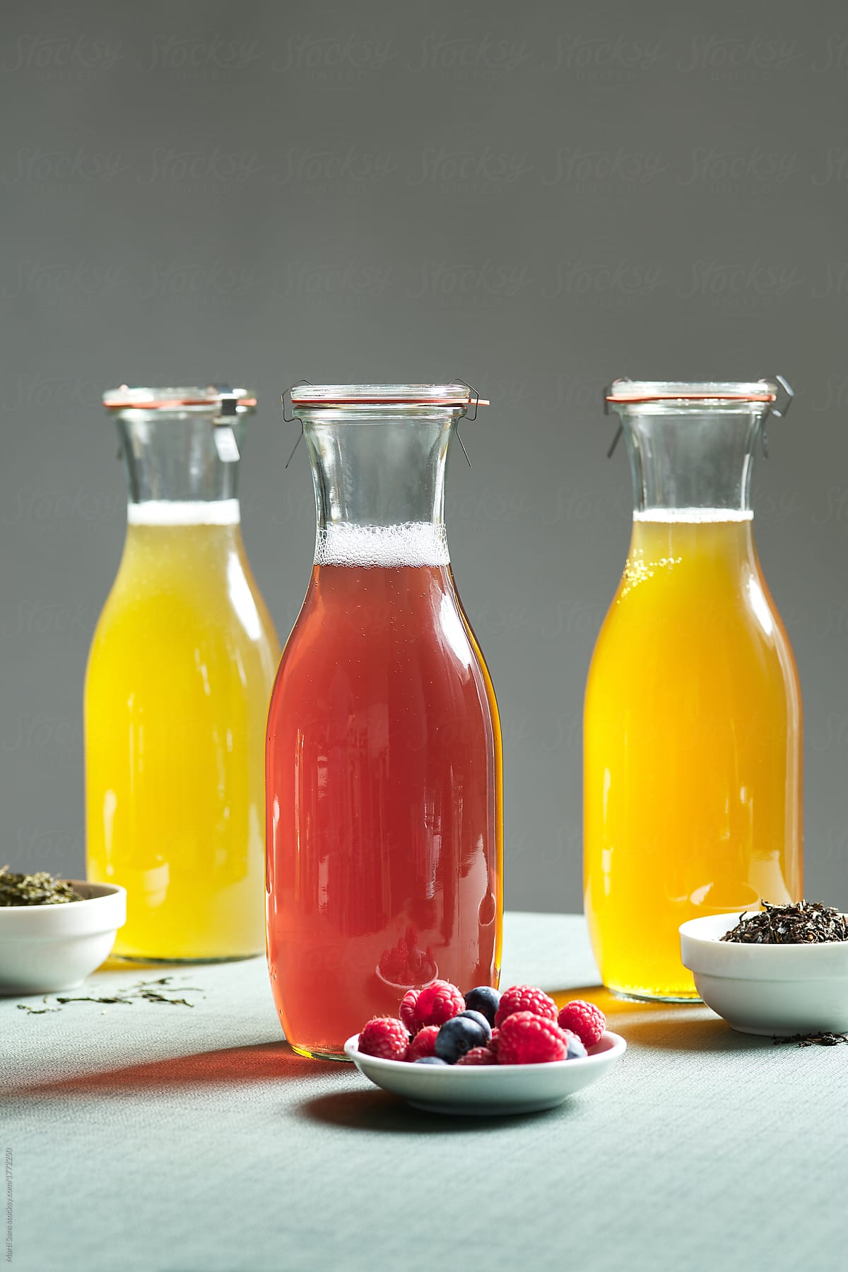 Alcohol free mocktails with berries and tea.