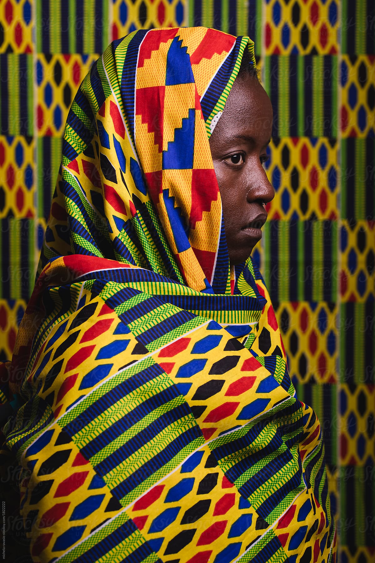 Profile of a young woman wearing a colored cloth