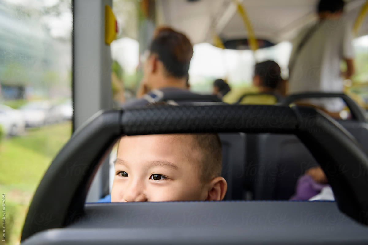 Child sitting on bus