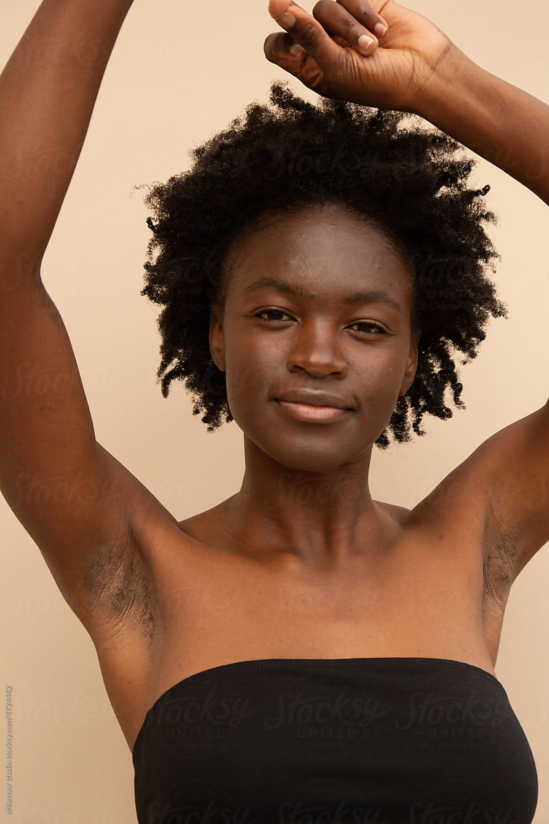 Woman showing armpits portrait