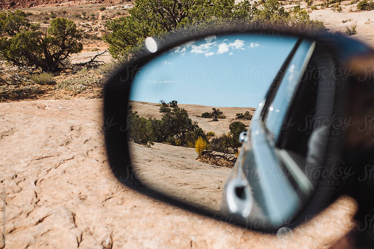 Driving off the road through the desert surroundings of Moab, UT