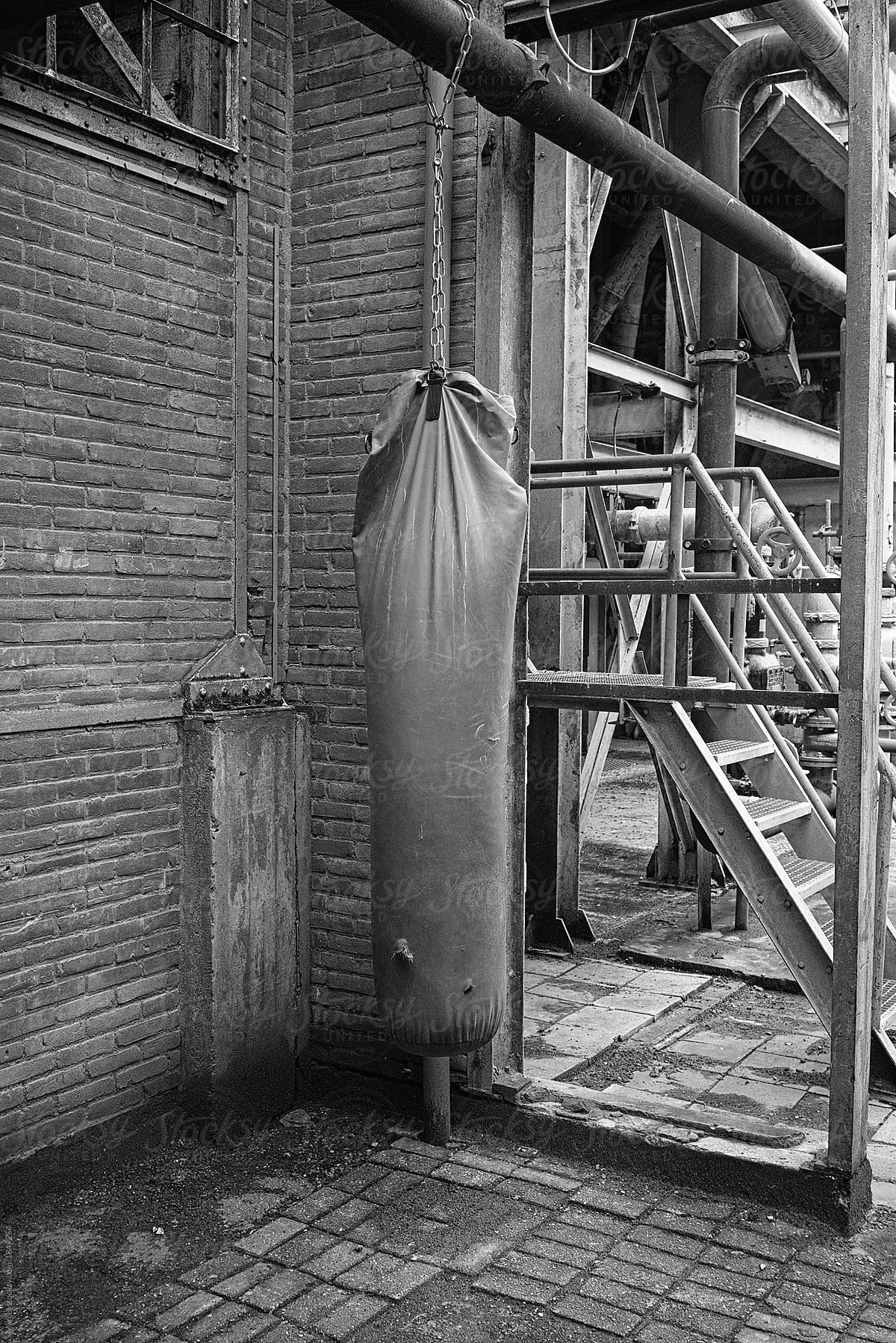 Punching bag in a deserted factory