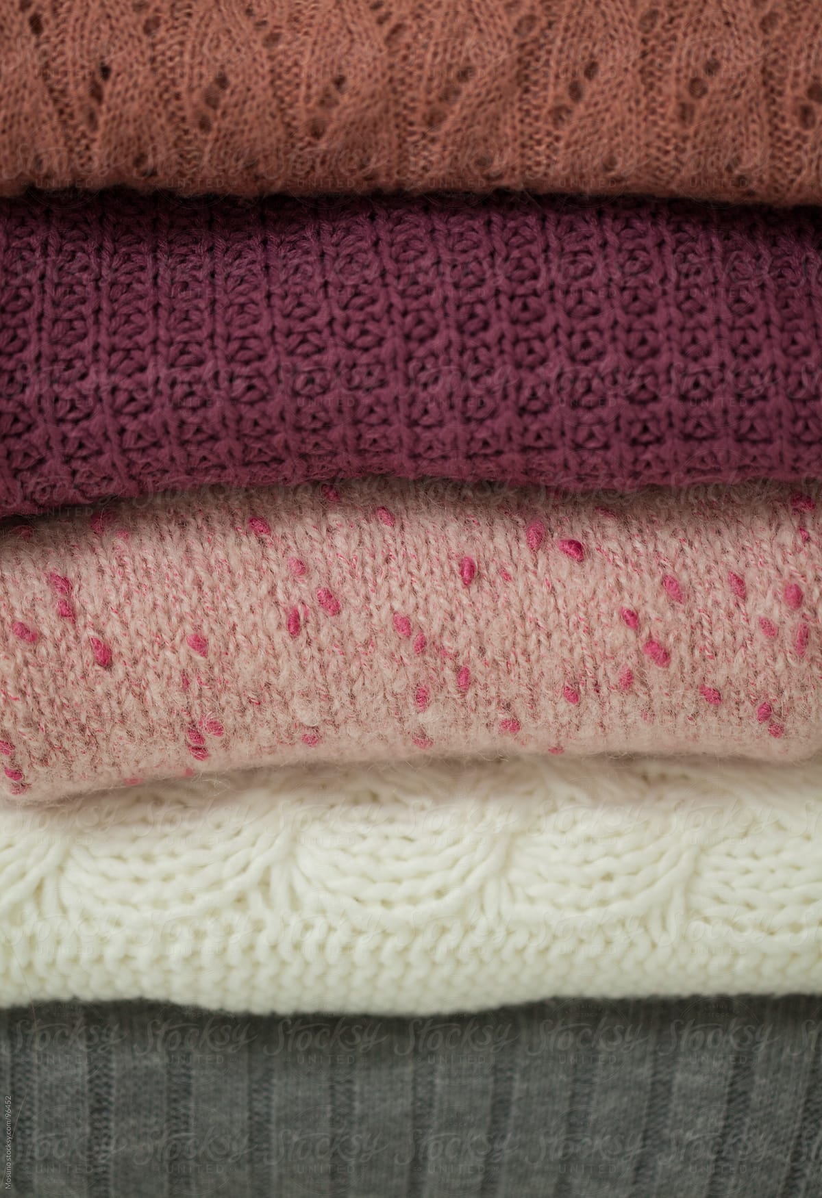 Pile of Sweaters as a Background