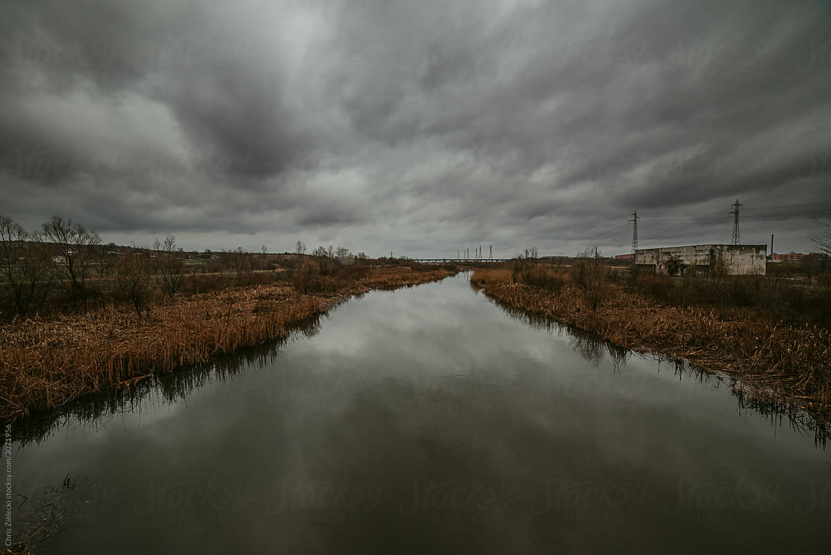 Calm river on cloudy day