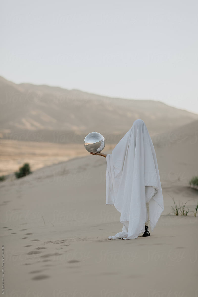 Desert Ghost Holding a Disco Ball