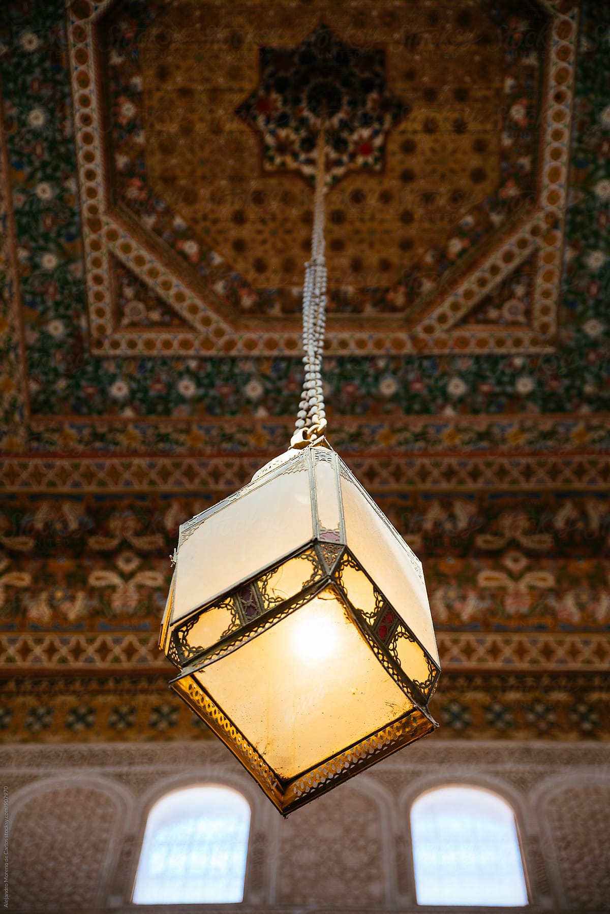 Lamp hanging in a room in Bahia Palace. Marrakech, Morocco