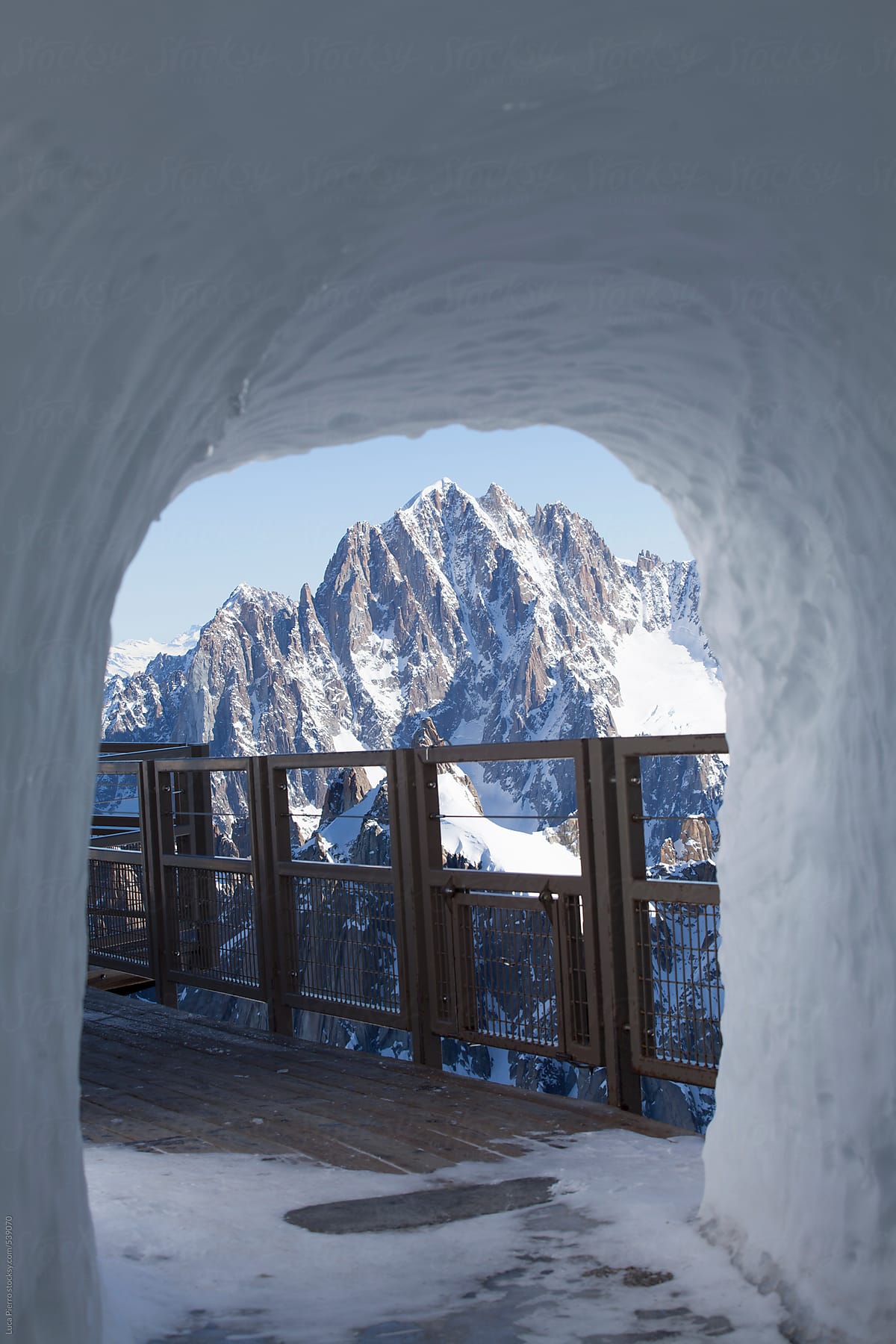 Mont Blanc massif through a tunnel in the snow