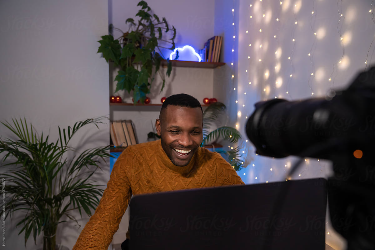 Man Smiling While Streaming In Live