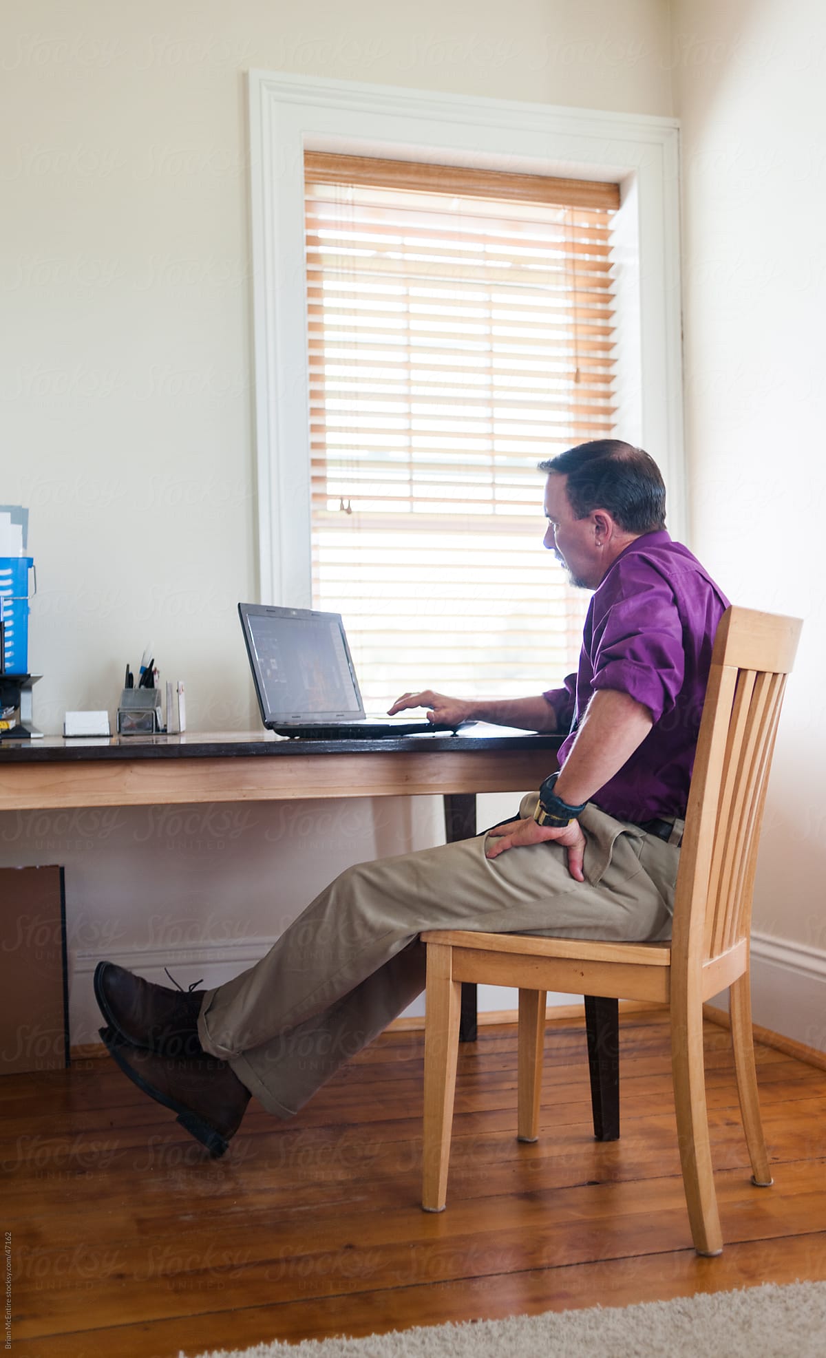Office Culture: Relaxed Attire Worn By Man in Residential Space