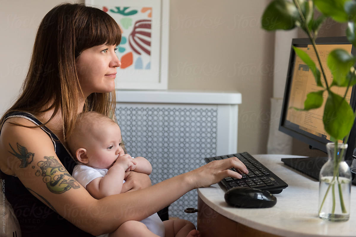 mom with baby at computer