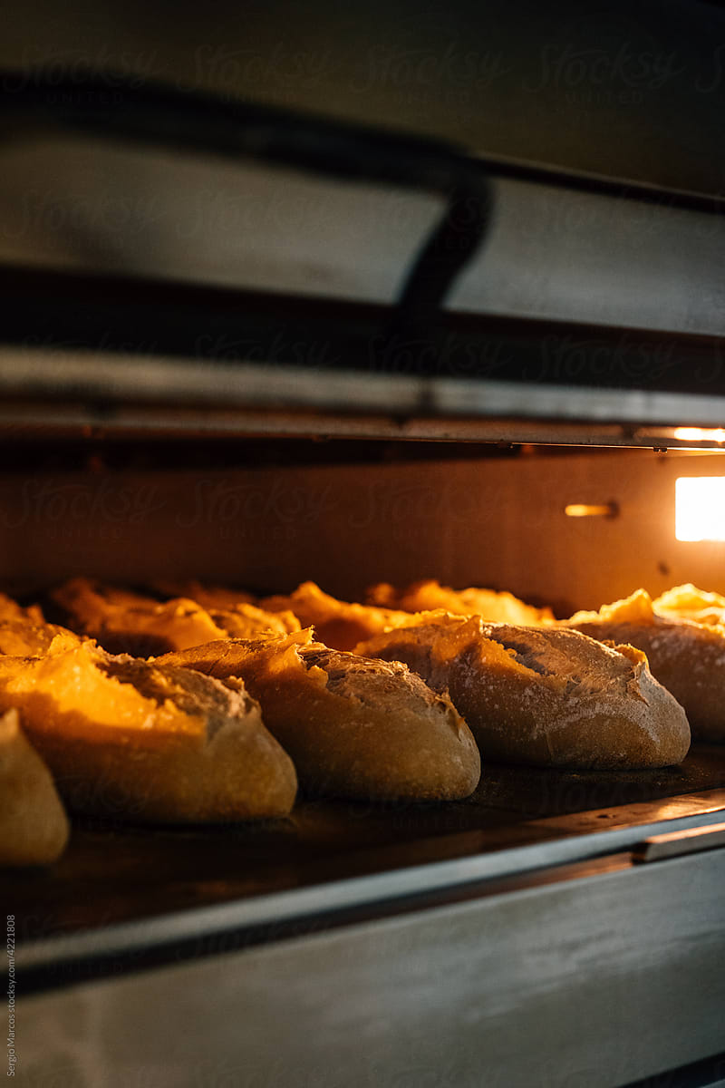Crispy loaves baking in oven