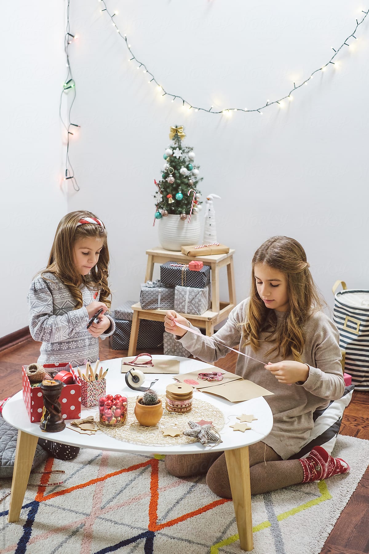 Children Making Christmas Cards At Home