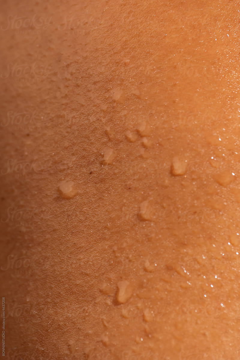 Drops of water on sweaty skin