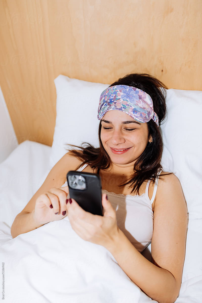 A woman With a Sleep Mask Wakes Up