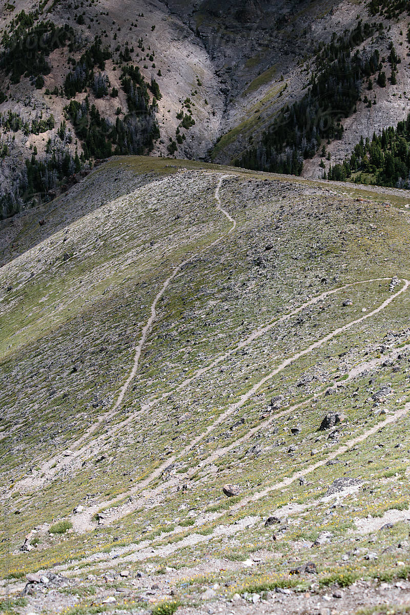 Trail switchbacks up mountain path
