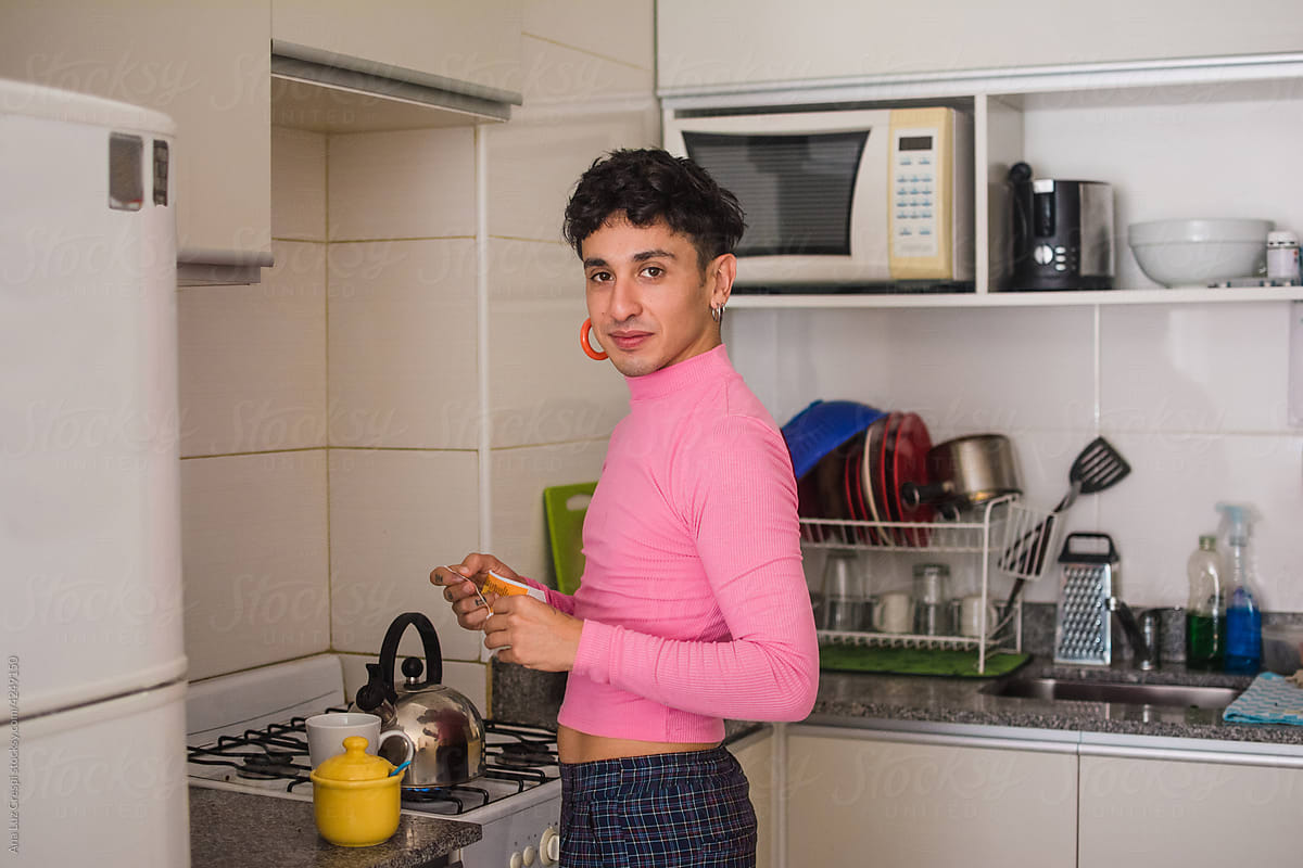 Gender fluid person in the kitchen portrait