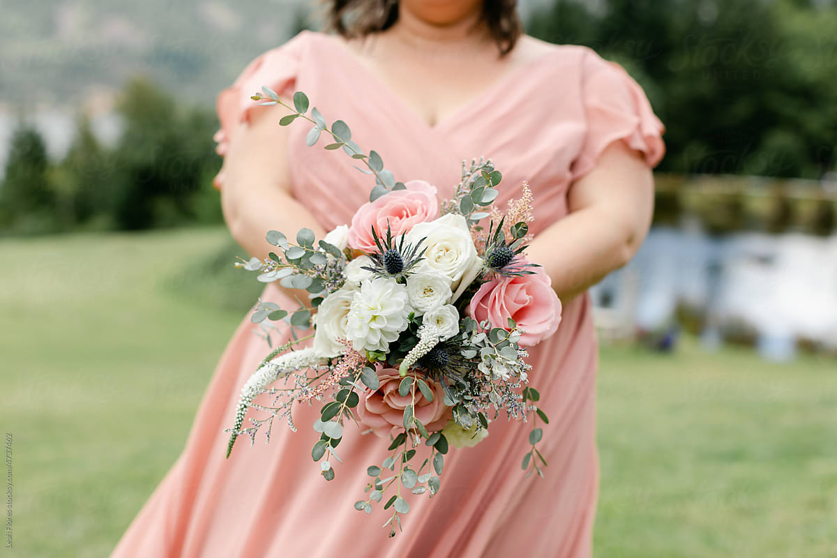 Closeup of an Anonymous Bridesmaid Holding Bouquet