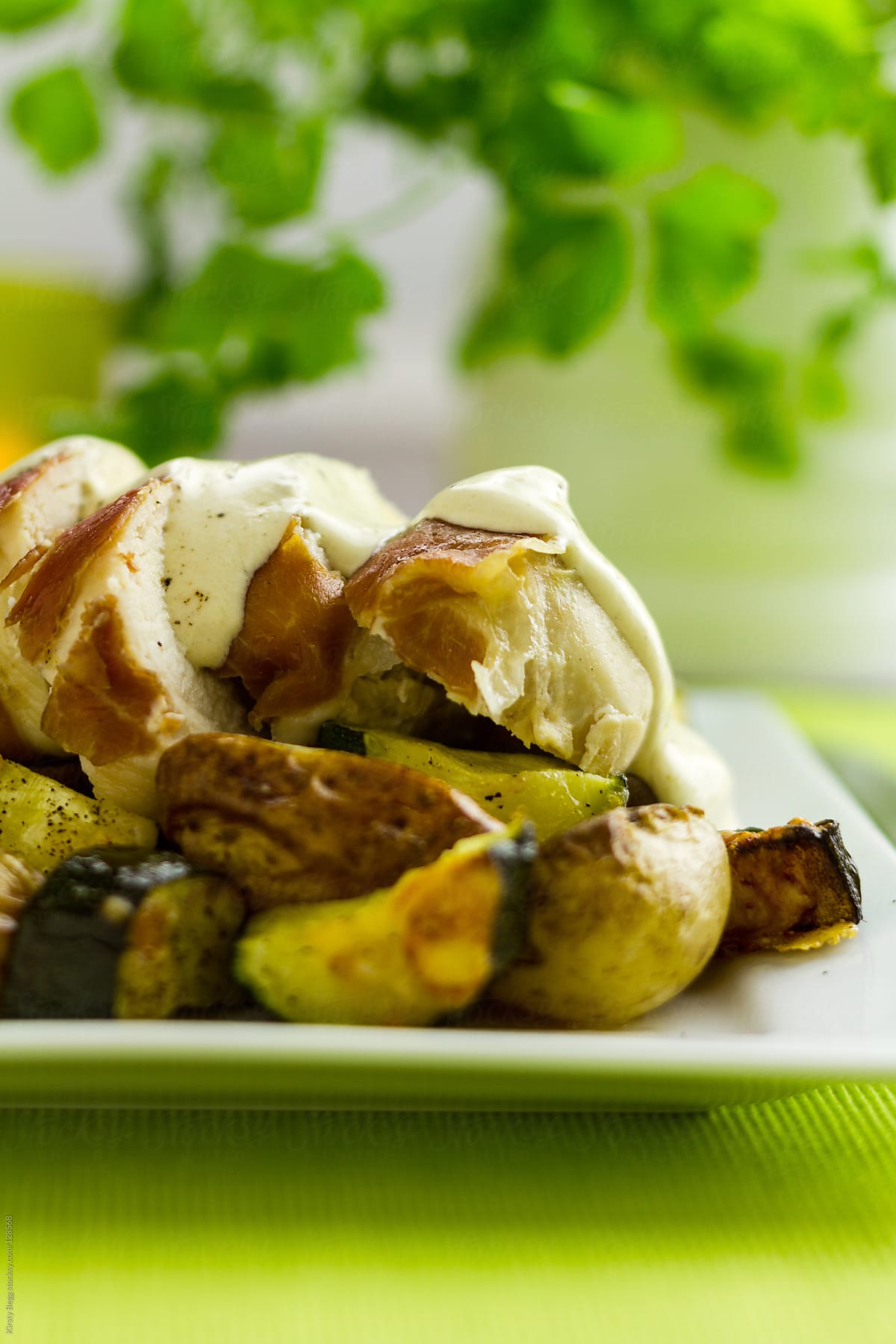 Prosciutto wrapped chicken with courgette and new potatoes