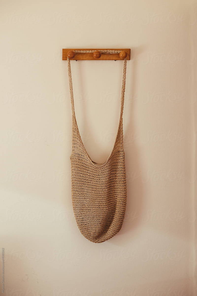 Vintage bag hanging from a coat rack