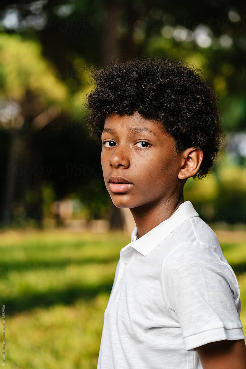 African American boy in summer park