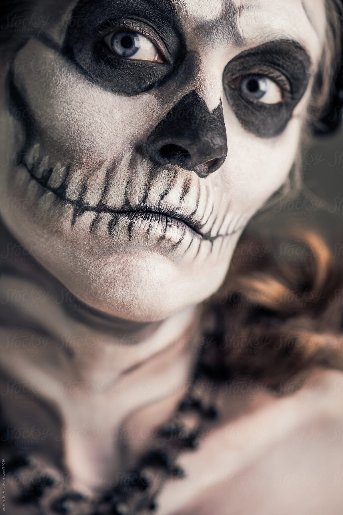Woman Painted as a Frightening Skeleton