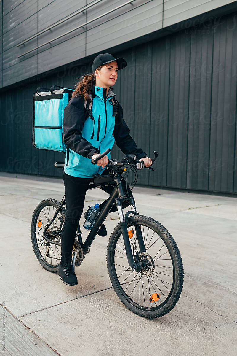 Delivery Woman Riding Bicycle