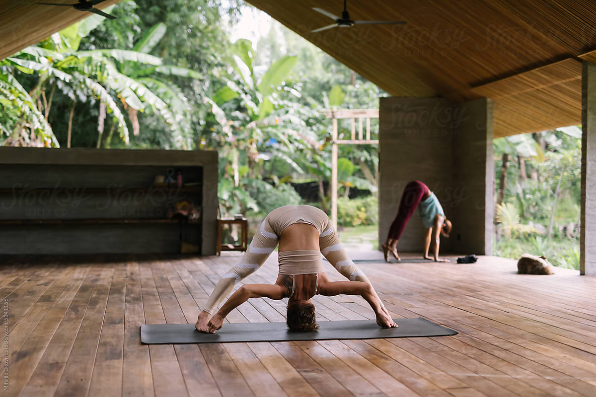 Woman exercising yoga in outdoors yoga studio