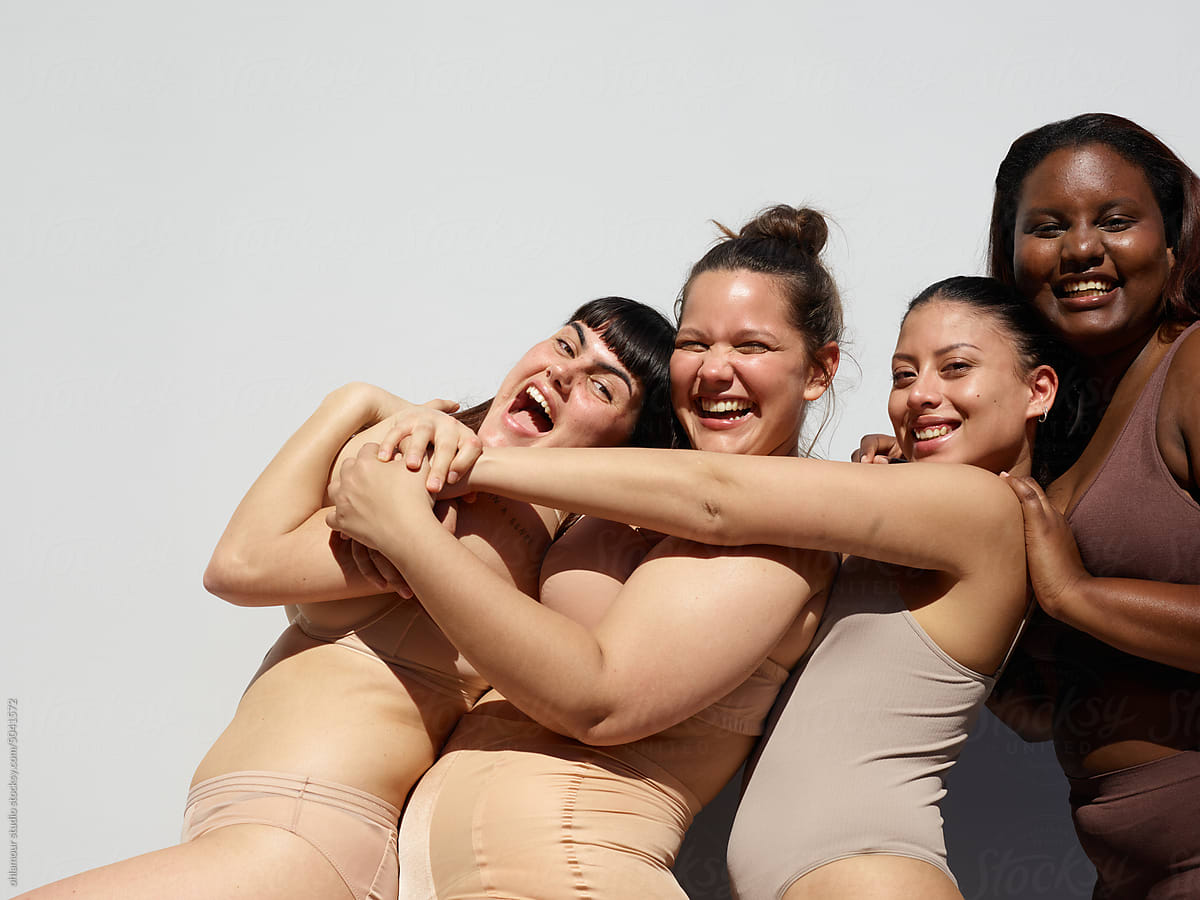 Group Of Women Having Fun In Their Undies by Stocksy Contributor Ohlamour  Studio - Stocksy