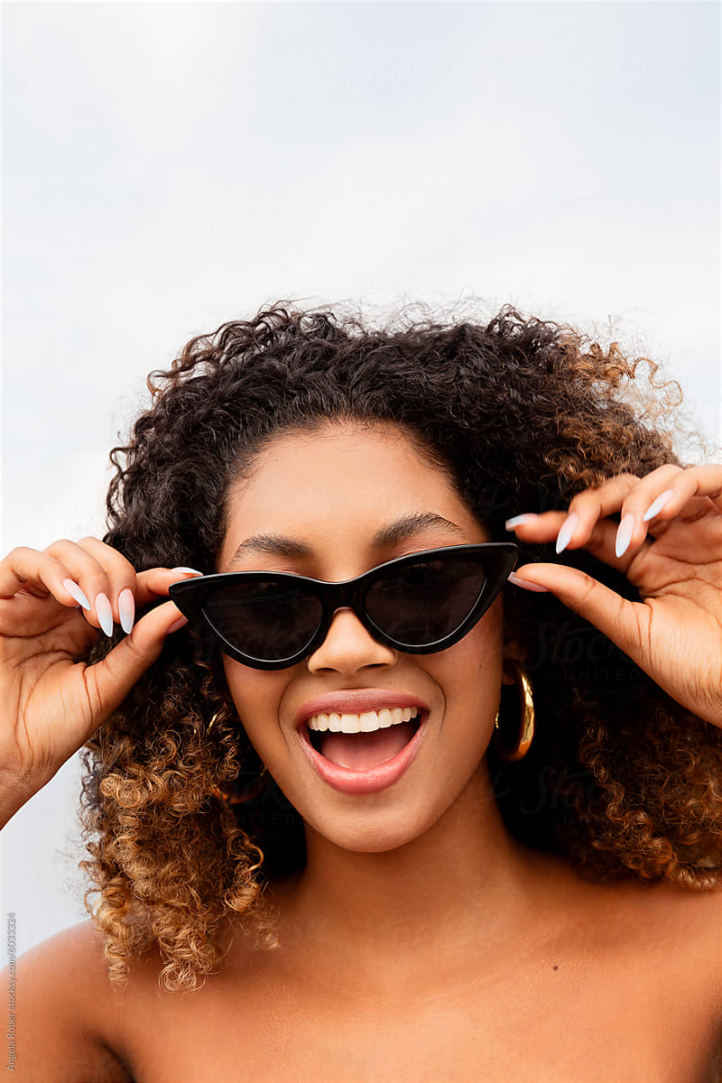 Joyful Woman Posing with Sunglasses