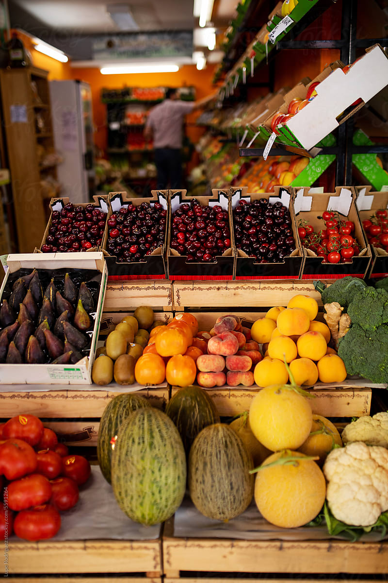 fruits and vegetables displayed in a fruit store