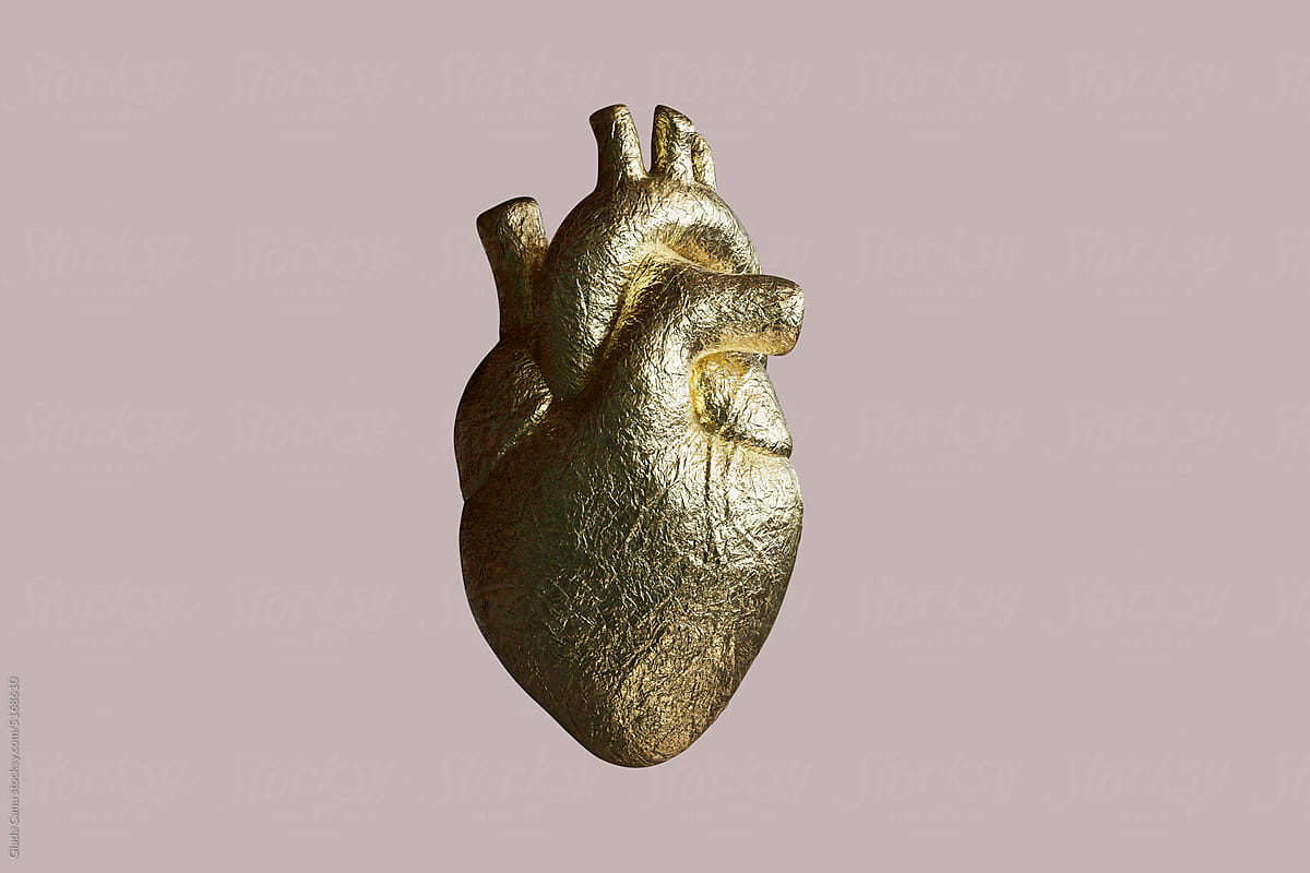 A 3D Rendered Image of a Golden Human Heart for Valentine\'s Day