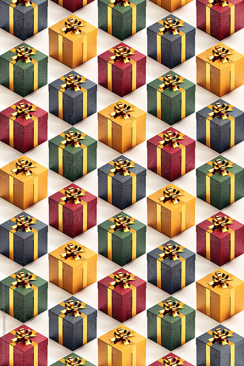 Pattern made of golden gift boxes with ribbons