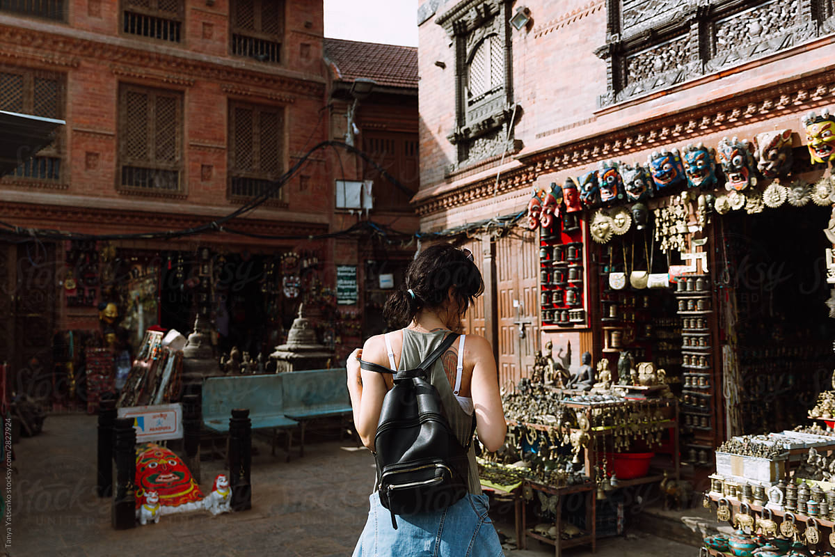 Woman near a gift shop in Swayambhunath Pagoda In Nepal